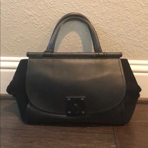 Black on black leather/suede Coach purse.